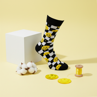 Thumbnail for Smiley sokken uitgelicht met stof en blok